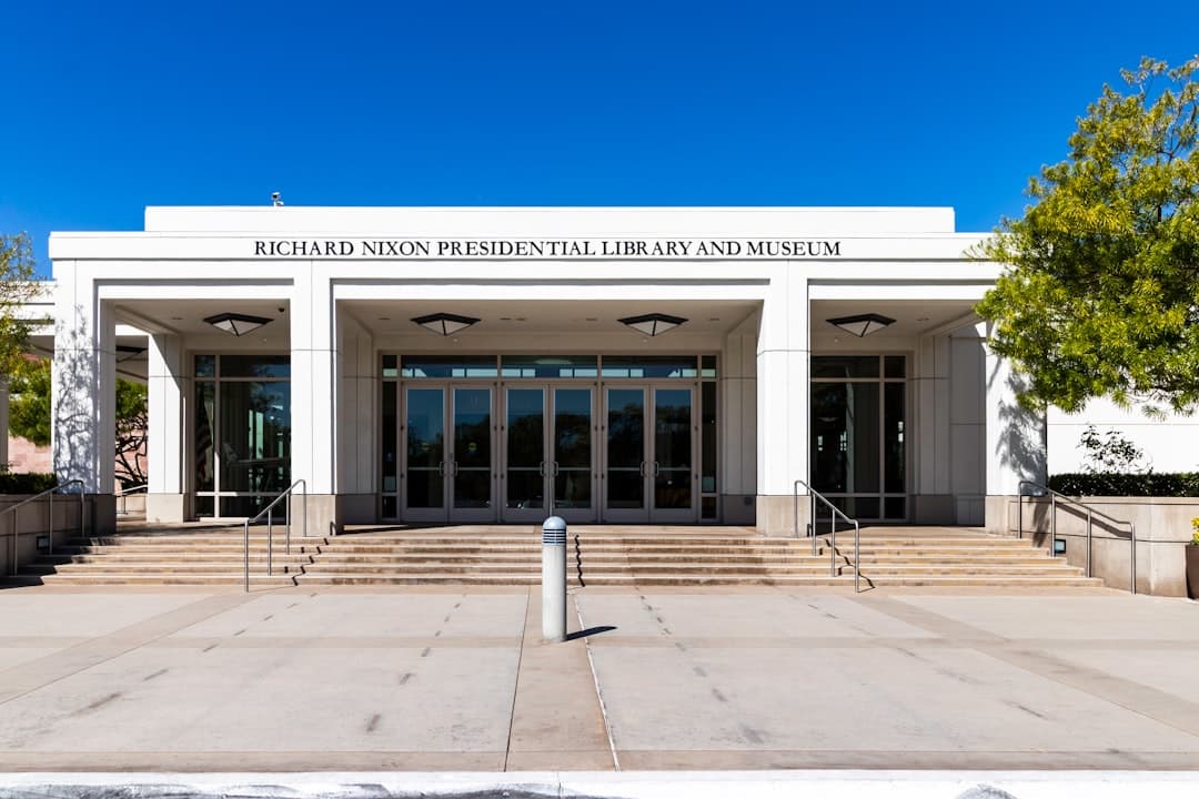 a large white building with steps leading up to it