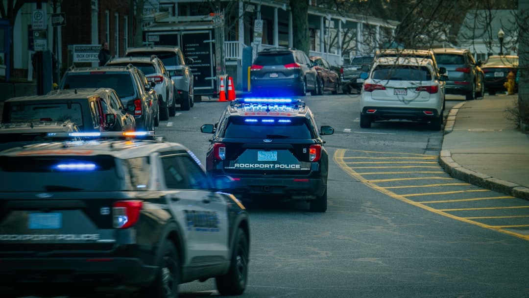 a police car parked on the side of a road