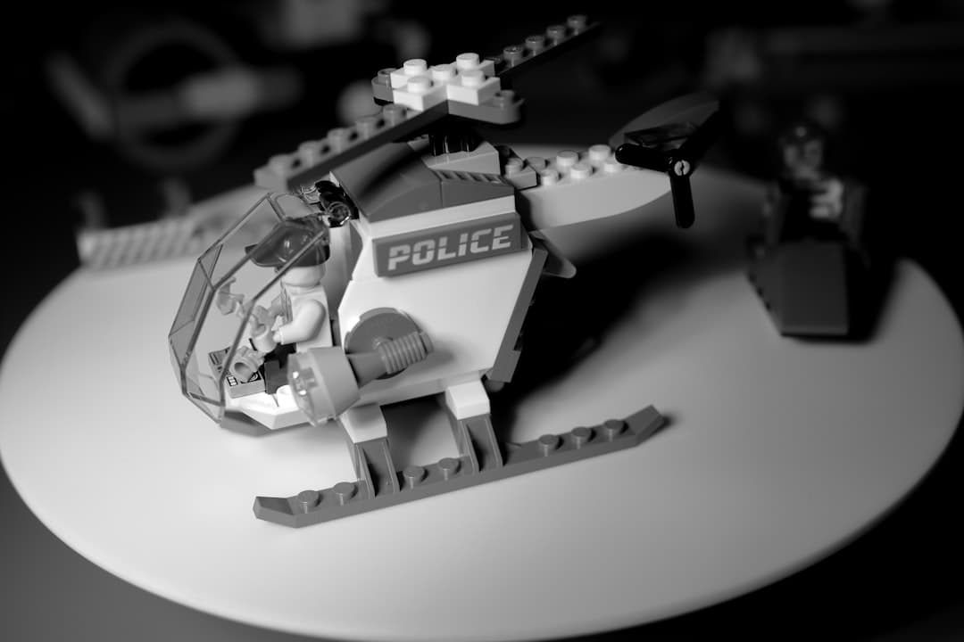 a black and white photo of a lego police car