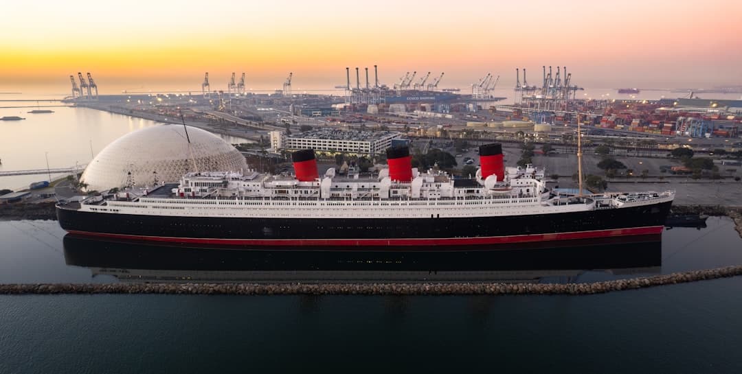 a large cruise ship docked in a harbor