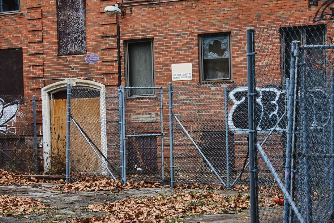 a brick building with graffiti on the side of it