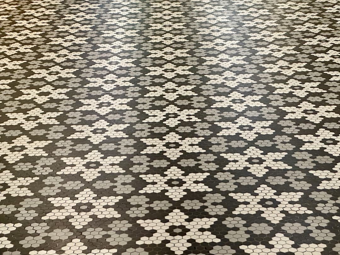 a black and white floor with a pattern on it